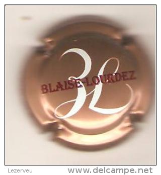 CAPSULE CHAMPAGNE BLAISE LOURDEZ DAMERY (rouge Et Blanc Sur Rose Metallisé ) - Autres & Non Classés