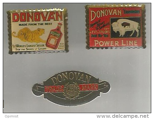 34817-lot  De 3  Pin's.Donovan.Tigre.Bison . . - Marques