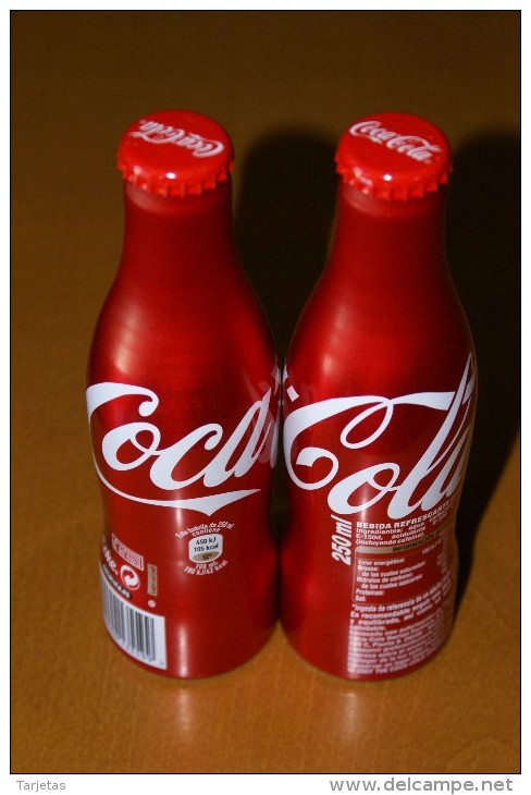 BOTELLA DE ALUMINIO DE ESPAÑA DE COCA-COLA (COKE) NUEVA SIN ABRIR Y CON LA BEBIDA - Botellas