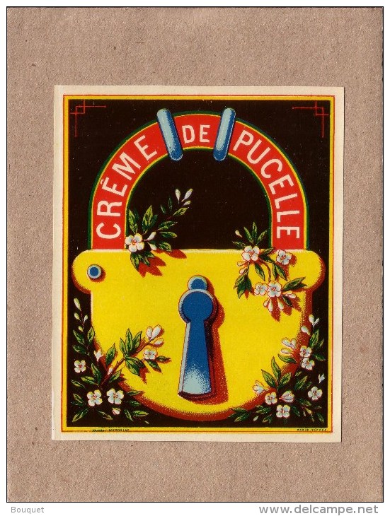 ETIQUETTE - CREME DE PUCELLE - " EROTISME " - SERRURE - CADENAS - FLEURS - IMPRIMERIE JOUNEAU BOURDILLAT - 114 X 92 Mm - Autres & Non Classés