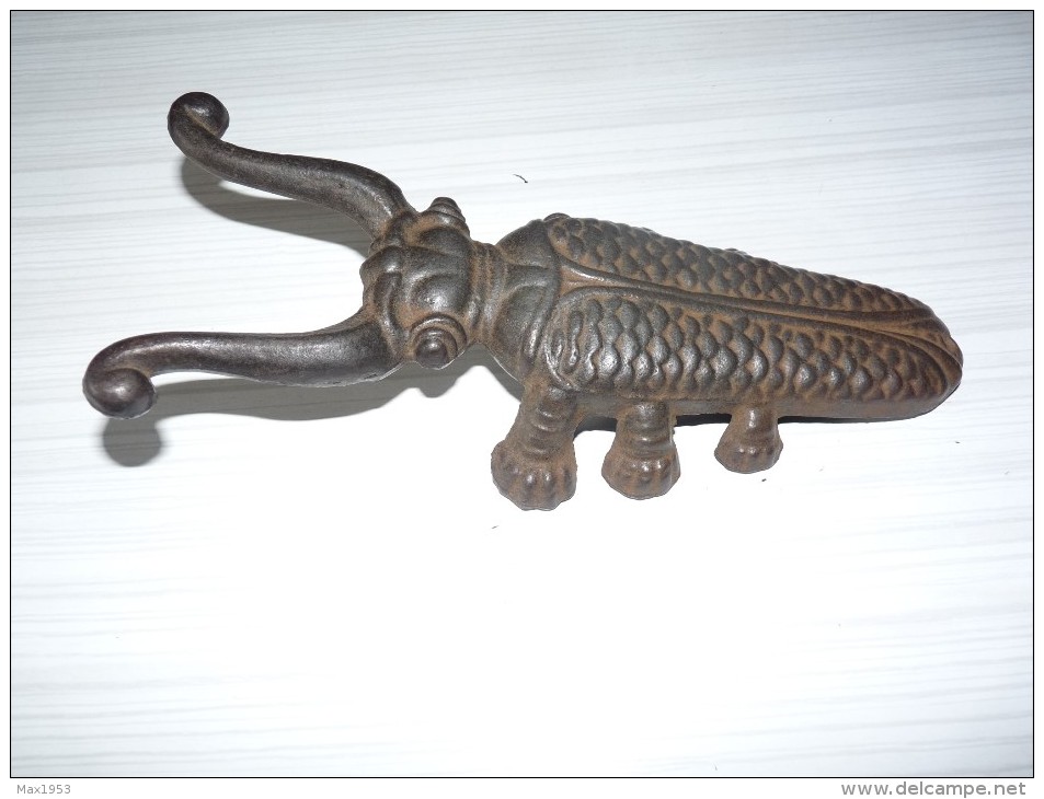 Tire-bottes Scarabée en fonte brune - Moinat SA - Antiquités