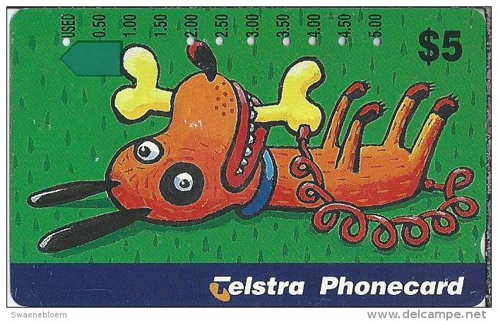 Telefoonkaart.- Australië. Telstra Phonecard - Cartoon, Hond Met Bot. Animal, Dog - Australië