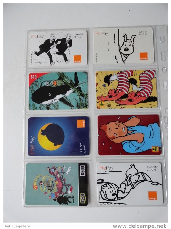 LOT OF 8 PHONECARDS TINTIN - Comics