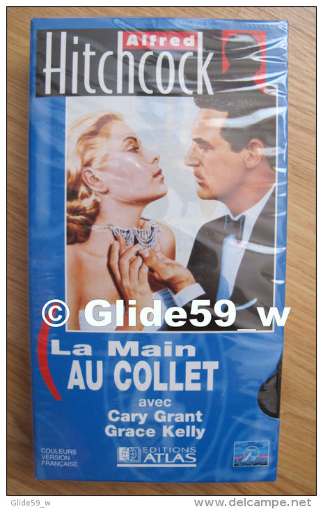Alfred Hitchcock - La Main Au Collet - K7 Vidéo VHS Couleur - Version Française (Ed. Atlas) - Neuve - Actie, Avontuur