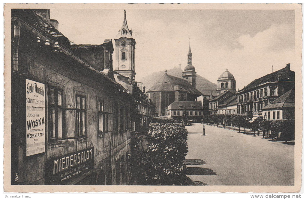 AK Brüx Most Markt Hermann Göring Platz Kirche Laden Miedersalon Lehranstalt Woska Stempel Erzgebirge A Komotau Chomutov - Sudeten