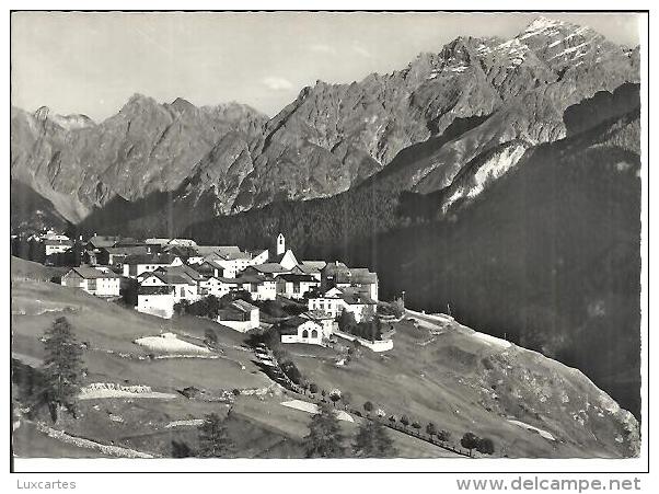 GUARDA IM UNTER-ENGADIN MIT PIZ PISOC. - Guarda