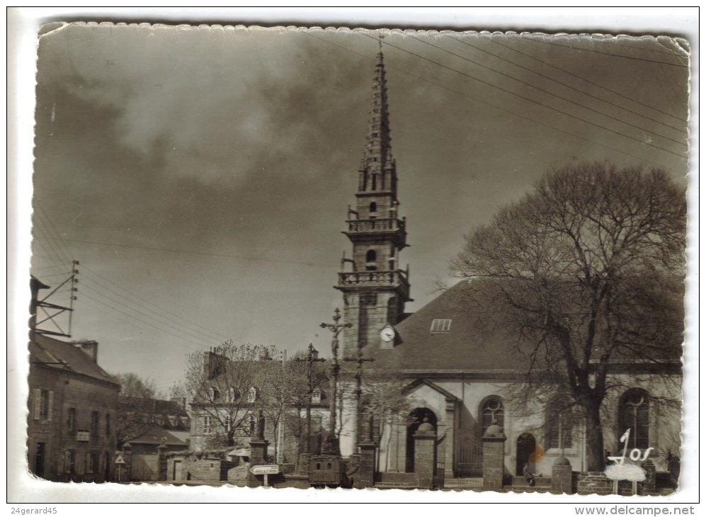 CPSM PLOUGUERNEAU (Finistère) - L'église Paroissiale Et Son élégant Clocher - Plouguerneau