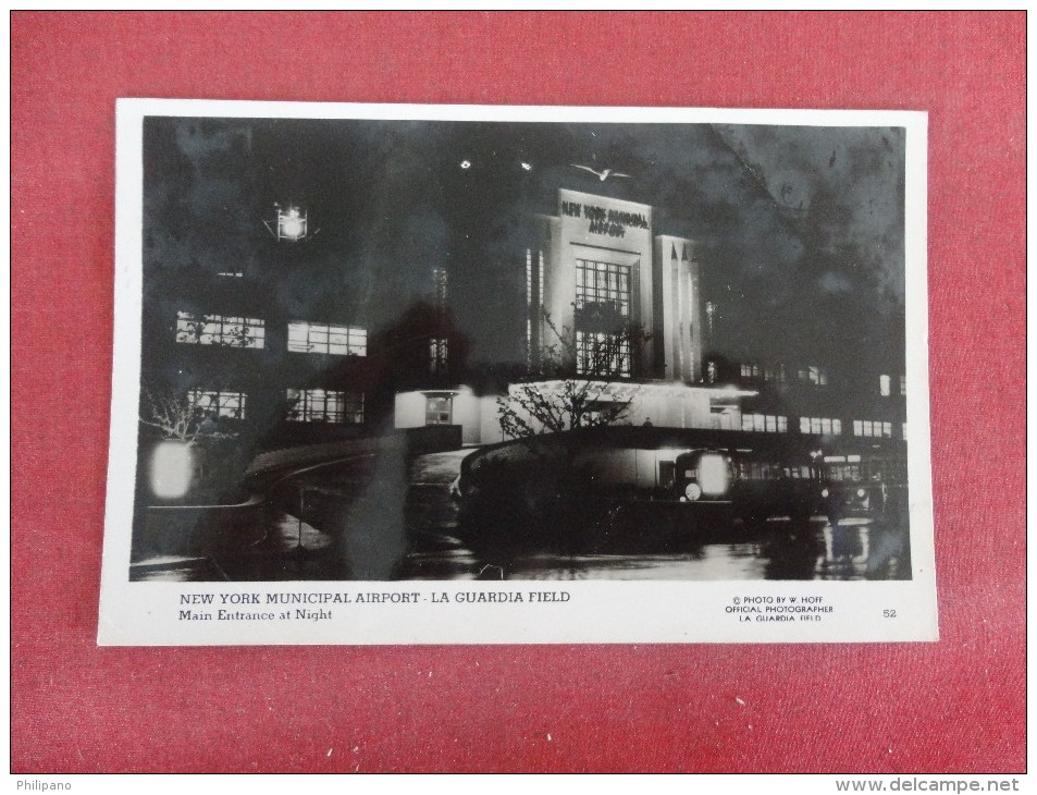 New York> New York City > Airports   RPPC  La Guardia Field Main Entrance At Night  2 Pin Hole -----  -----ref 1740 - Airports