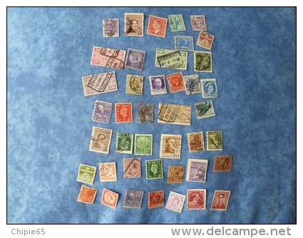 LOT DE 65 TIMBRES DIFFERENTS DANS SA POCHETTE D'ORIGINE - Vrac (max 999 Timbres)