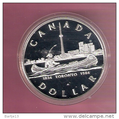 CANADA DOLLAR 1984 SILVER PROOF 150 YEARS TORONTO SPOTS ONLY ON  CAPSEL - Canada
