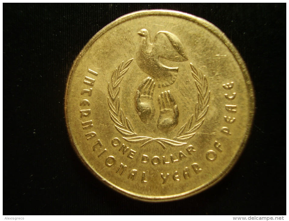 AUSTRALIA 1986 ONE DOLLAR  INTERNATIONAL YEAR Of PEACE  USED COIN GOOD CONDITION. - Dollar