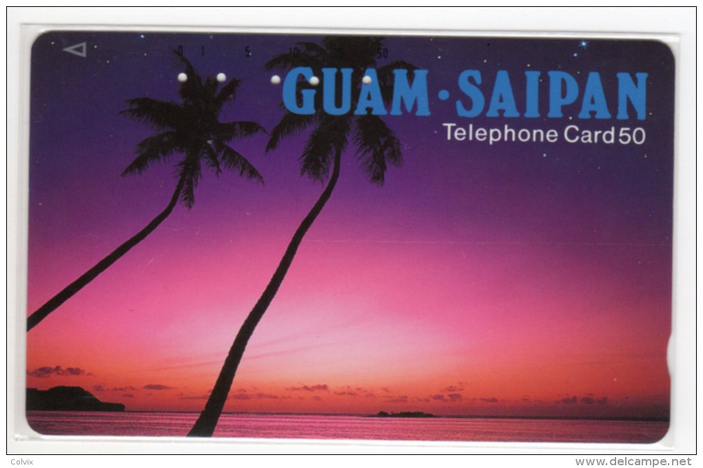 GUAM  TELECARTE JAPONAISE PALMIER COUCHER DE SOLEIL - Guam