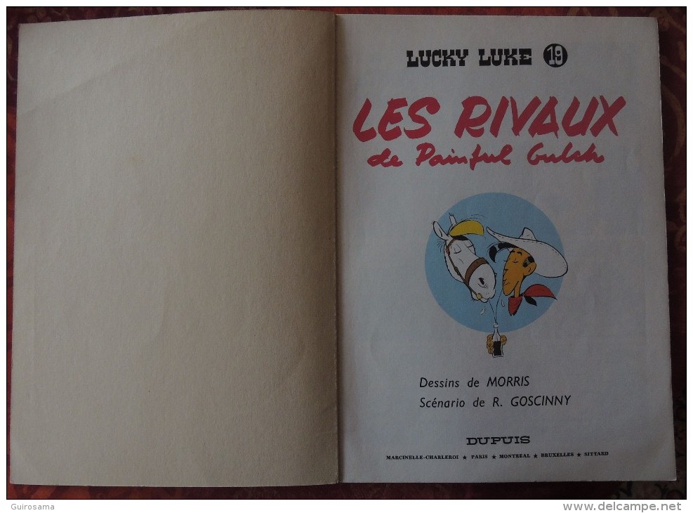 Morris et Goscinny : Lucky Luke - n°19 : Les rivaux de Painful Gulch - © 1969 - Ed. Dupuis - 46 p. - Offert par Total