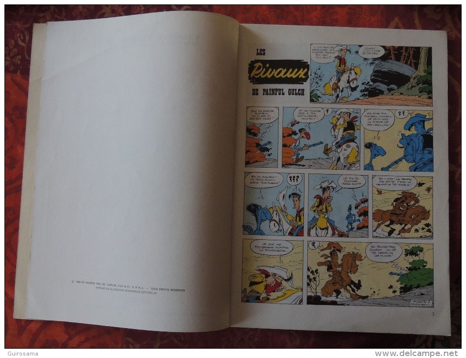 Morris et Goscinny : Lucky Luke - n°19 : Les rivaux de Painful Gulch - © 1969 - Ed. Dupuis - 46 p. - Offert par Total