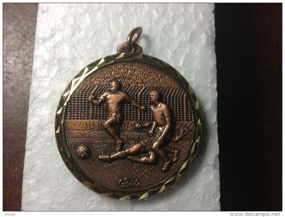 Medaille Football (tacle) - Kunstschaatsen