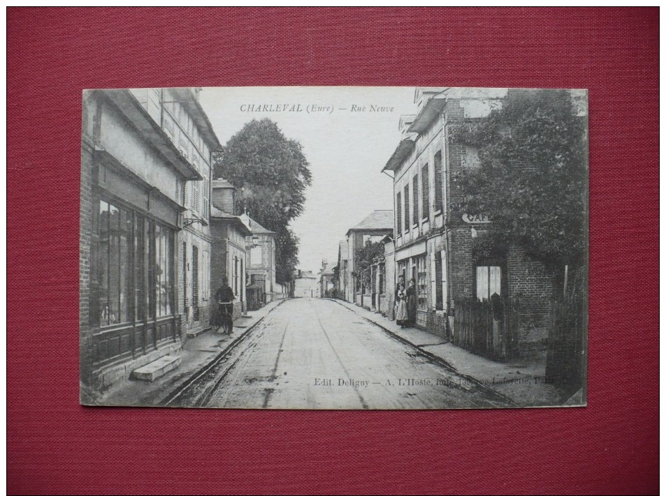 Cpa.r - Charleval (27) - Rue Neuve - éditions Deligny - Autres & Non Classés