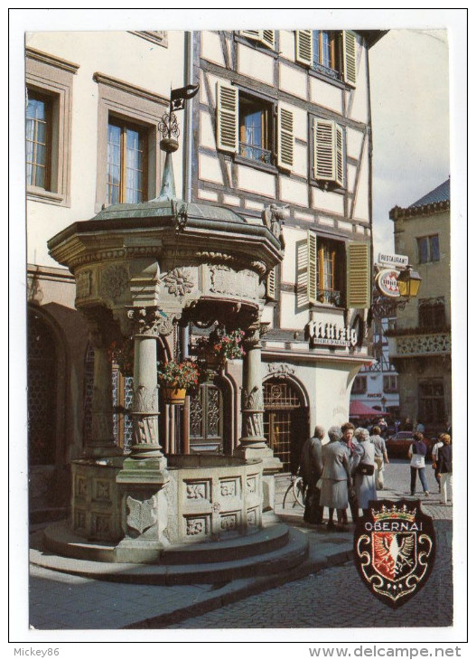 OBERNAI--1988--Le Puits Aux Six Seaux(animée,pub Bière "Mutzig" ,blason ),cpm éd Robo-cachet Chatellerault-86-pont,musée - Obernai