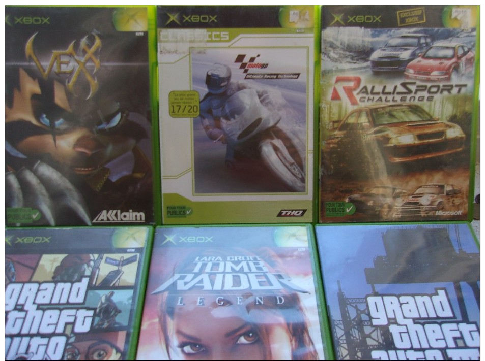 console Xbox première génération  + 1 Manette + 10 Jeux Xbox + 4 Jeux Xbox 360 + 5 Je GAMECUBE + 4 Jeux PS2 + 1 Jeux PS1