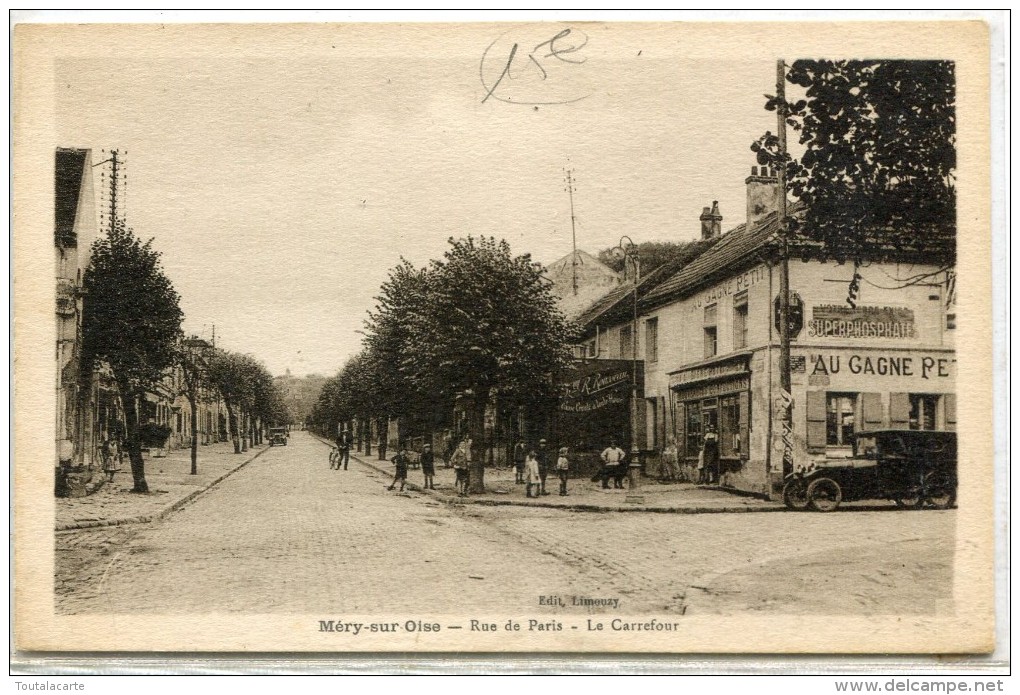 CPA 95 MERY SUR OISE RUE DE PARIS LE CARREFOUR Commerce Voiture - Mery Sur Oise