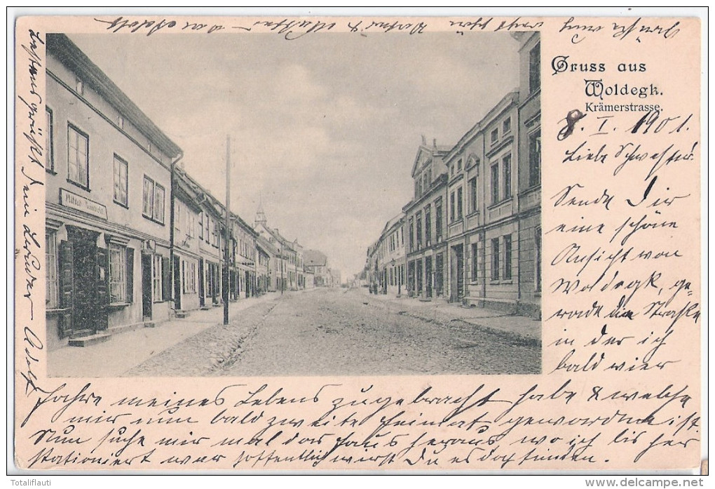 Gruss Aus WOLDEGK Krämerstrasse Links Alfred Meinhold Danach Schuhmacher C Bebel 8.1.1901 Nach Fürstenwerder - Neubrandenburg