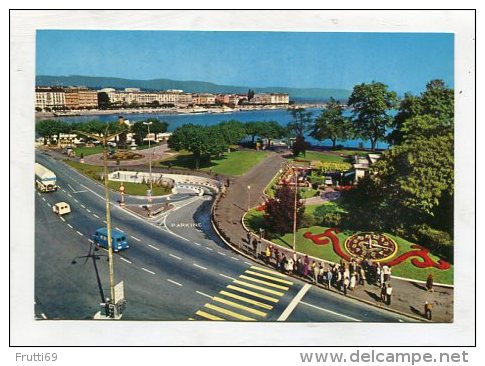 SWITZERLAND - AK 251524 Genève - L´Horologe Fleurie Et L'entrée Du Parking Sous-lacustre - Genève