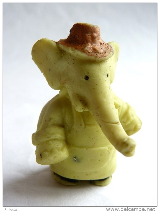 TRES RARE FIGURINE BABAR EN MOUSSE DE PLASTIQUE THR 1969 ANTAR Pas GLUPS BABAR JARDINIER Jaune - Autres & Non Classés