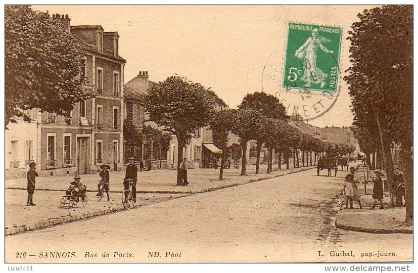 CPA - SANNOIS (95) - Aspect De La Rue De Paris En 1915 - Au 1° Plan Une Voiturette D'enfant - Sannois