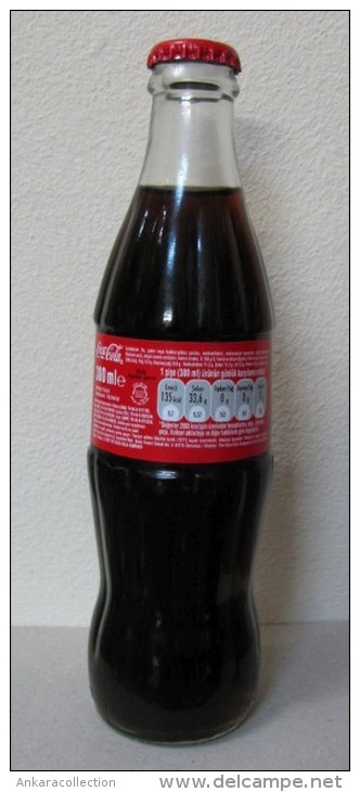 AC - COCA COLA EMPTY GLASS BOTTLE & CROWN CAP 300 Ml FROM TURKEY - Bottles