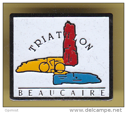 48480-Pin's.Beaucaire.Triathlon.cyclisme.natation.athletisme.. - Athlétisme