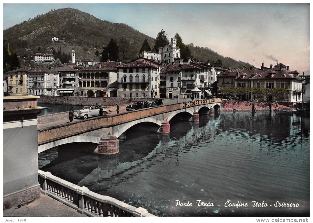 04730 "PONTE TRESA (TI / CH) -  CONFINE ITALO - SVIZZERO" ANIMATA. COL. A MANO SU NEGAT.  CART. POST. ORIG. NON SPEDITA. - Tresa