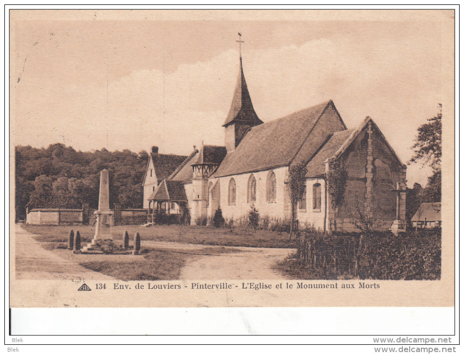 27. Eure : Pinterville . L ´ église  Et Le Monument Aux Morts . - Pinterville