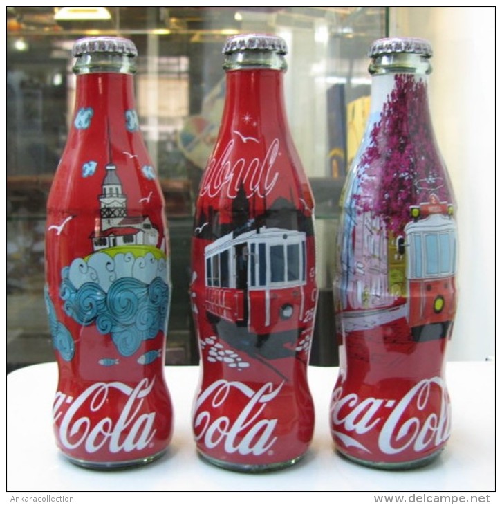 AC - COCA COLA ISTANBUL SERIES SHRINK WRAPPED 3 EMPTY GLASS BOTTLES & CROWN CAPS - Bouteilles