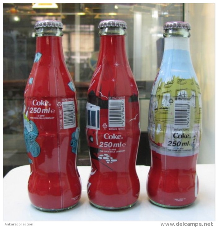 AC - COCA COLA ISTANBUL SERIES SHRINK WRAPPED 3 EMPTY GLASS BOTTLES & CROWN CAPS - Botellas