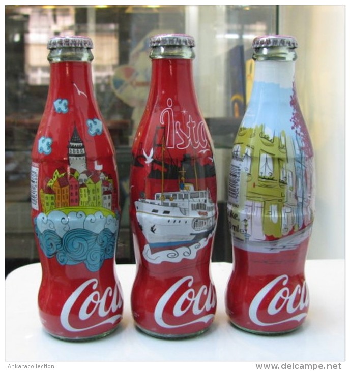 AC - COCA COLA ISTANBUL SERIES SHRINK WRAPPED 3 EMPTY GLASS BOTTLES & CROWN CAPS - Bottles