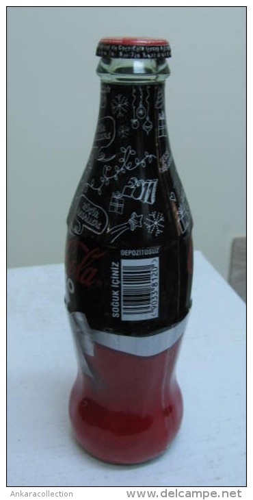 AC - COCA COLA ZERO - HAPPY NEW YEAR 2010 SHRINK WRAPPED EMPTY GLASS BOTTLE - Bouteilles