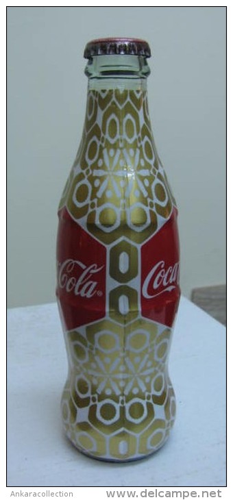 AC - COCA COLA - SHRINK WRAPPED EMPTY GLASS BOTTLE 2010 - Bottles