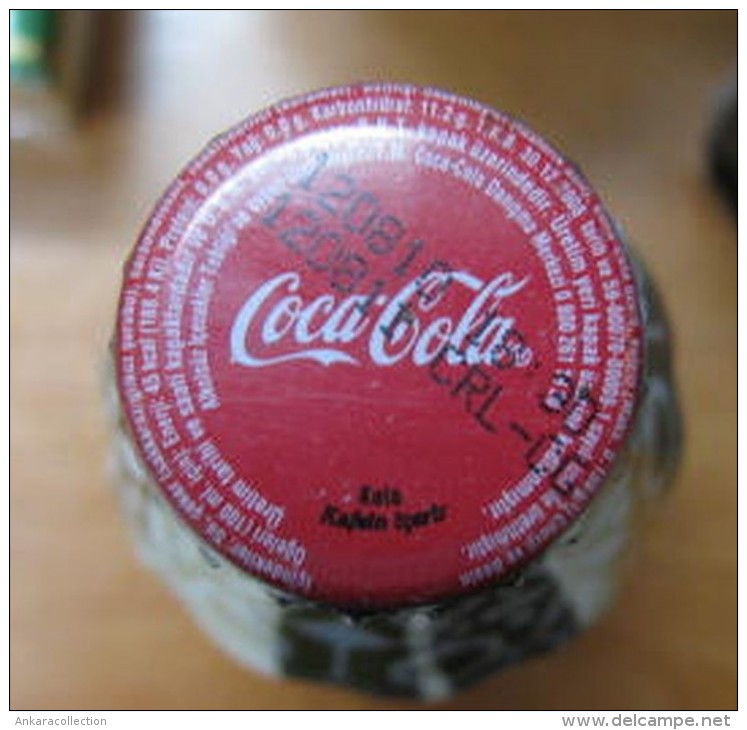 AC - COCA COLA - SHRINK WRAPPED EMPTY GLASS BOTTLE 2010 - Bouteilles