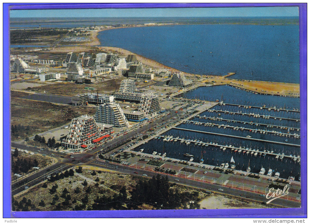 Carte Postale 34. La Grande Motte  Vue D'avion Et Au Loin Le Grau-du-Roi Trés Beau Plan - Autres & Non Classés