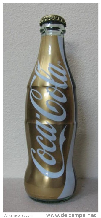 AC - COLA COLA - SHRINK WRAPPED EMPTY GLASS BOTTLE 250 Ml # 5 FROM TURKEY - Flessen