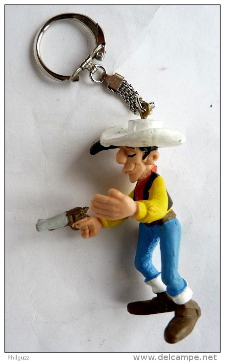 RARE FIGURINE LUCKY LUKE SCHLEICH 1984 PORTE CLES -  LUCKY LUKE AVEC REVOLVER UNE PAILLE DANS LA BOUCHE Paille Manquante - Autres & Non Classés