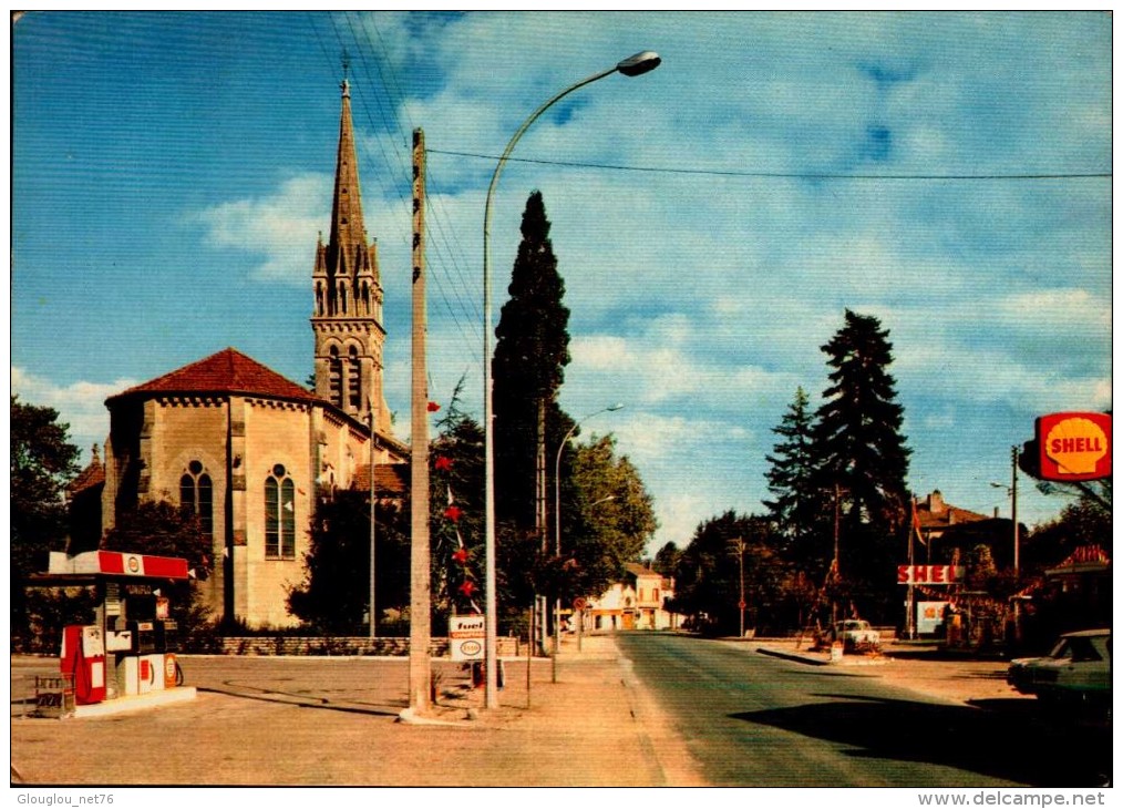 47-LIBOS..L'EGLISE ET L'AVENUE DE VILLENEUVE  AVEC STATIONS ESSENCE...CPM - Libos