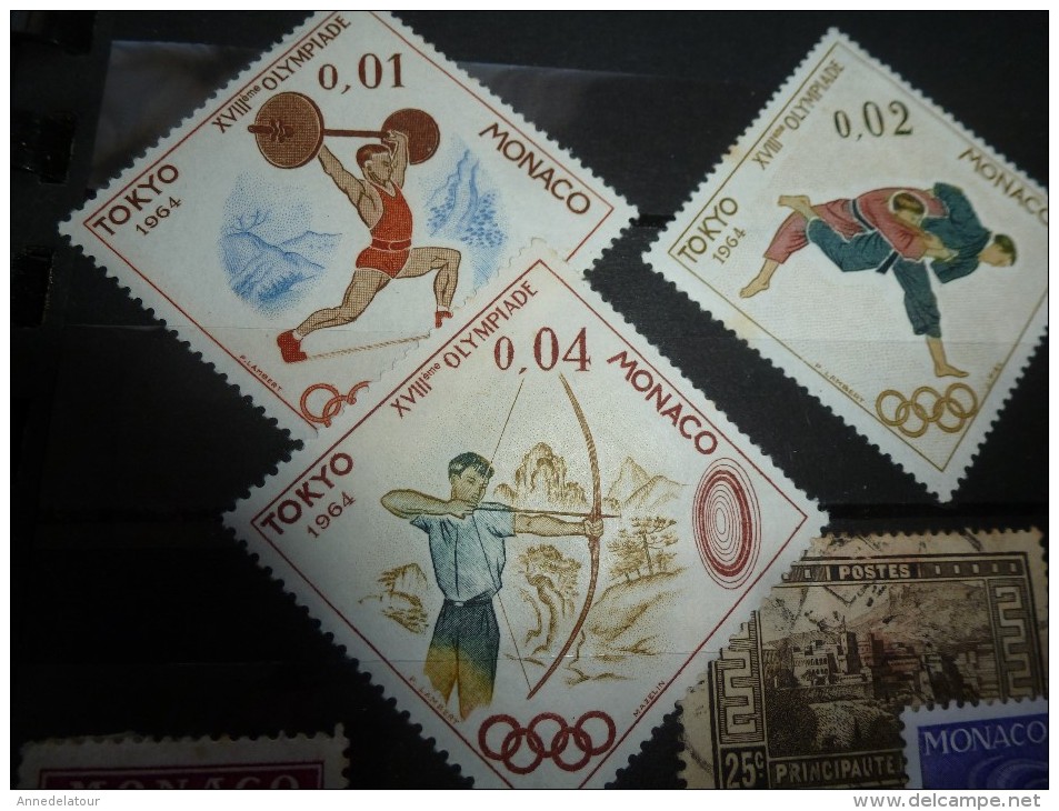 Album comprenant divers timbres anciens (Belgique,Australia,Andore,France,New-Zealand,Monaco dont Olympiades)