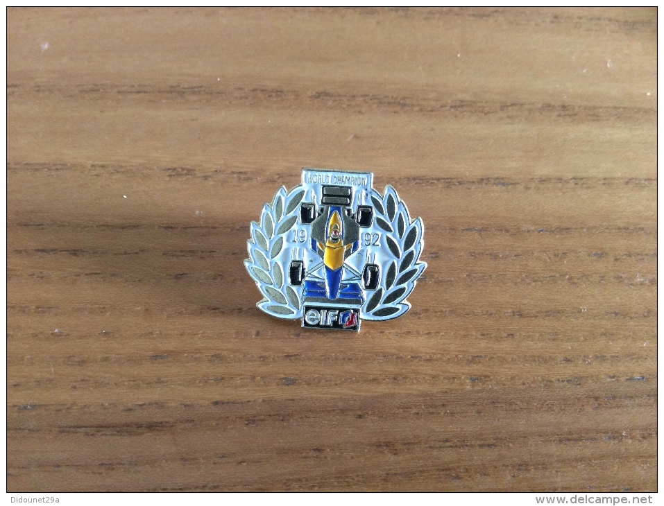 Pin´s * "elf WORLD CHAMPION 1992" (Formule 1 Jaune) - Automobile - F1