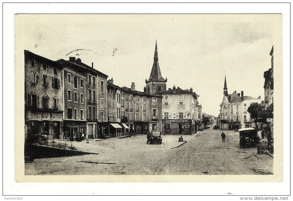 HAUTE-LOIRE / CRAPONNE-sur-ARZON / PLACE DU FAUBOURG CONSTANT ( Automobiles + ECONOMATS DU CENTRE ) / Beau DAGUIN , 1950 - Craponne Sur Arzon