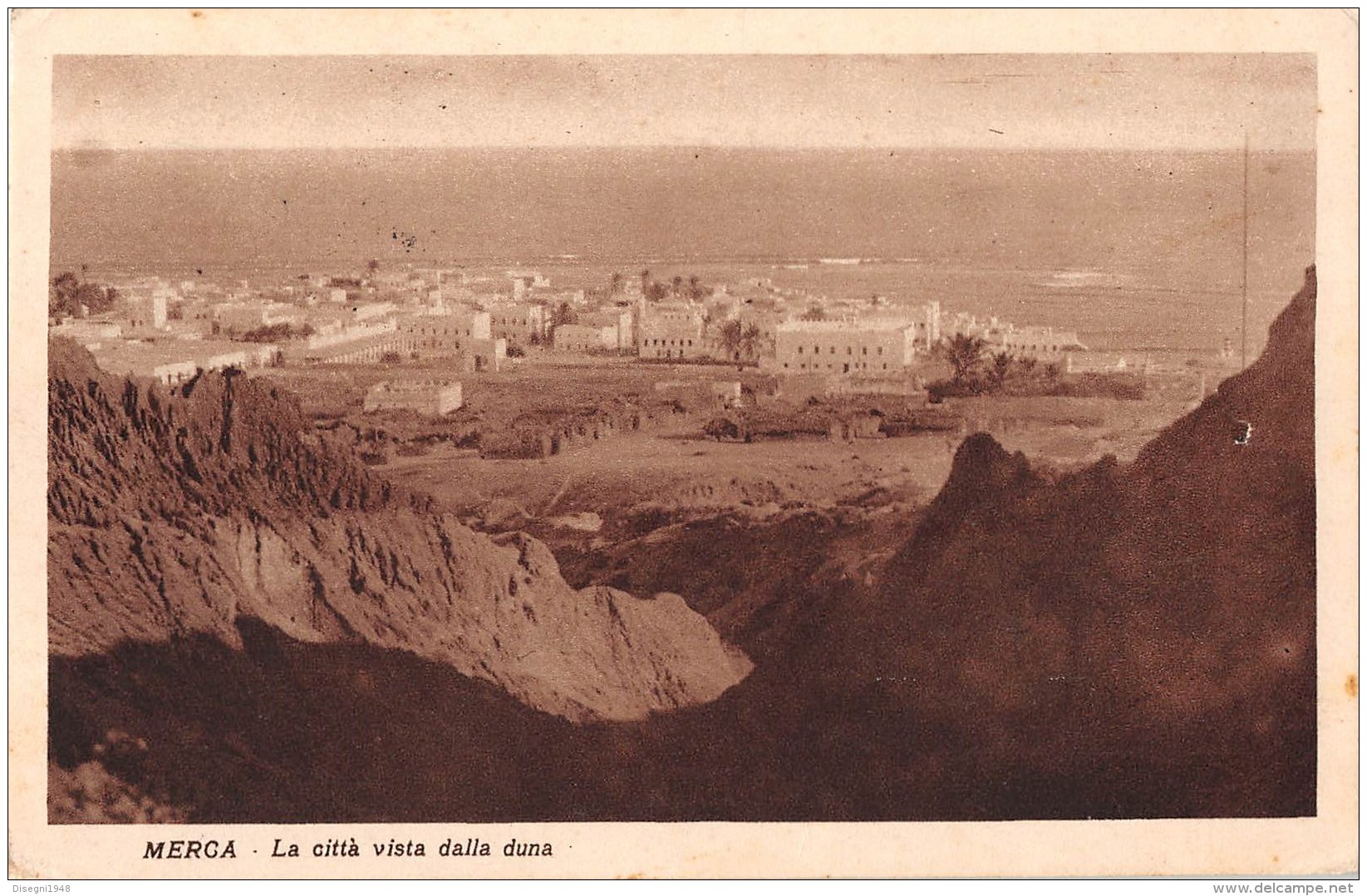 05611 "SOMALIA  - AFRICA ORIENTALE - MERCA - LA CITTA' VISTA DALLA DUNA" . CART. POST. ORIG. SPEDITA 1932. - Somalia