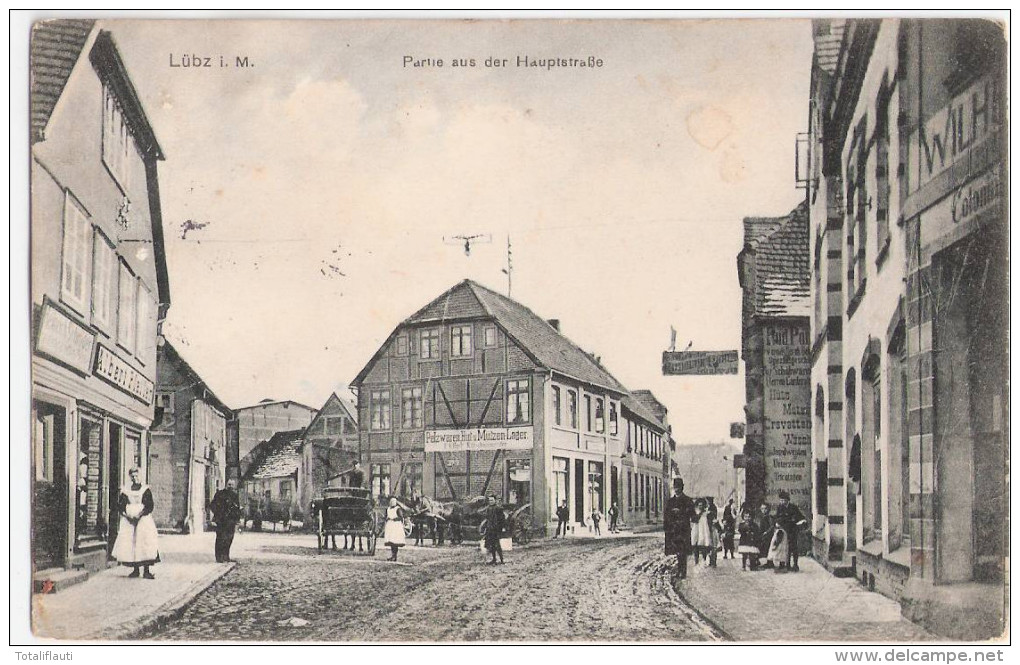 LÜBZ Partie Auf Der Hauptstraße Belebt Pferde Kutsche Geschäfte Bahnpost 24.8.1918 Gelaufen - Lübz