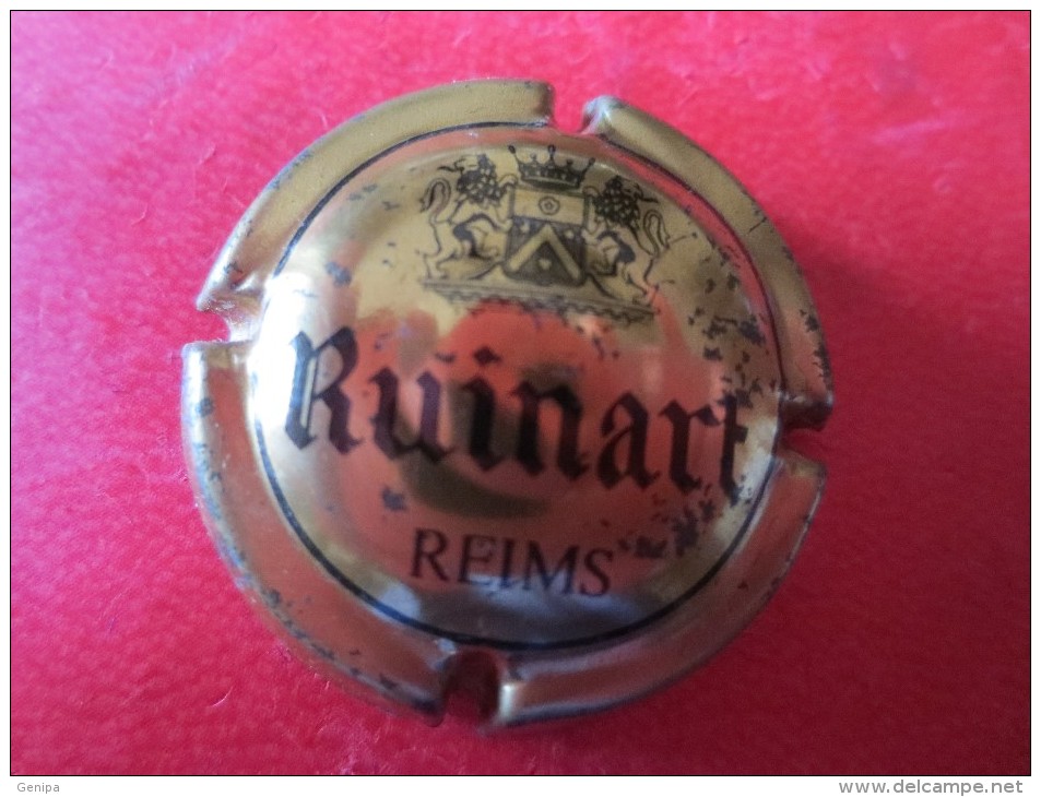 RUINART. . Or Vif Et Noir. Boucle En Haut Du T - Ruinart Ruinart Reims