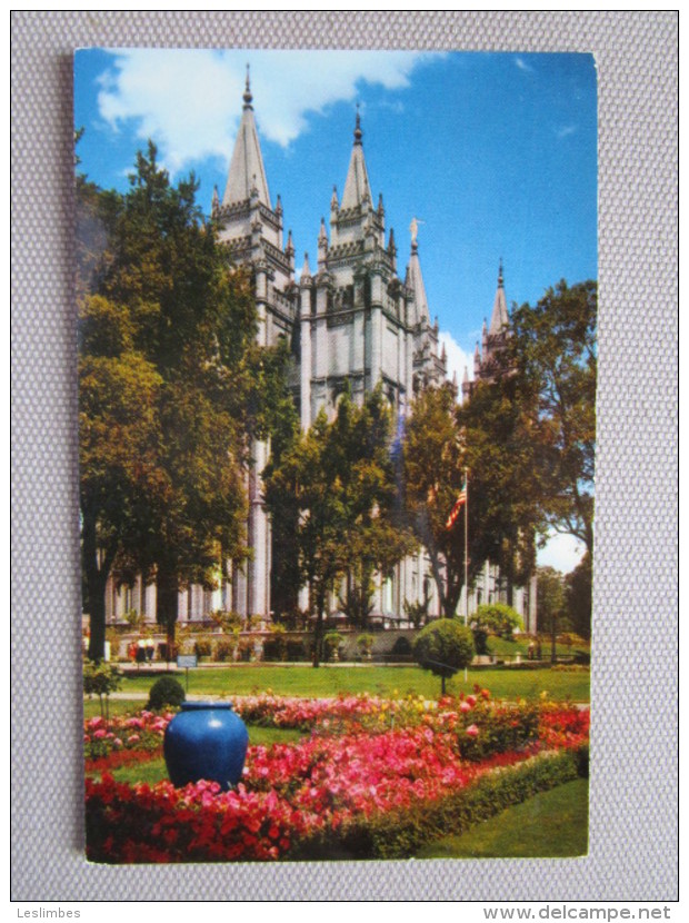 Salt Lake Temple. The Famous Mormon Temple (requiring 40 Years To Complete) With One Of The Many Beautiful Flower Garden - Salt Lake City