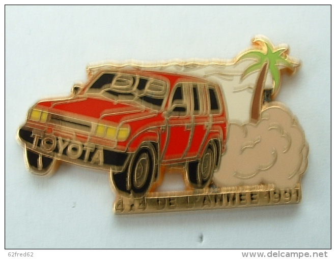 Pin´s TOYOTA ROUGE  - 4 X 4 DE L´ANNEE 1991 - ARTHUS BERTRAND - Toyota