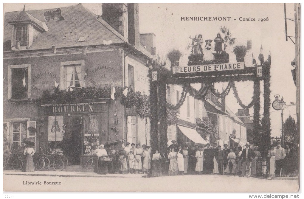 HENRICHEMONT  -  COMICE 1908  -  Librairie BOUREUX, Publicités Parapluie Et Toiles Cirées ( Carte Très Animée ). - Henrichemont